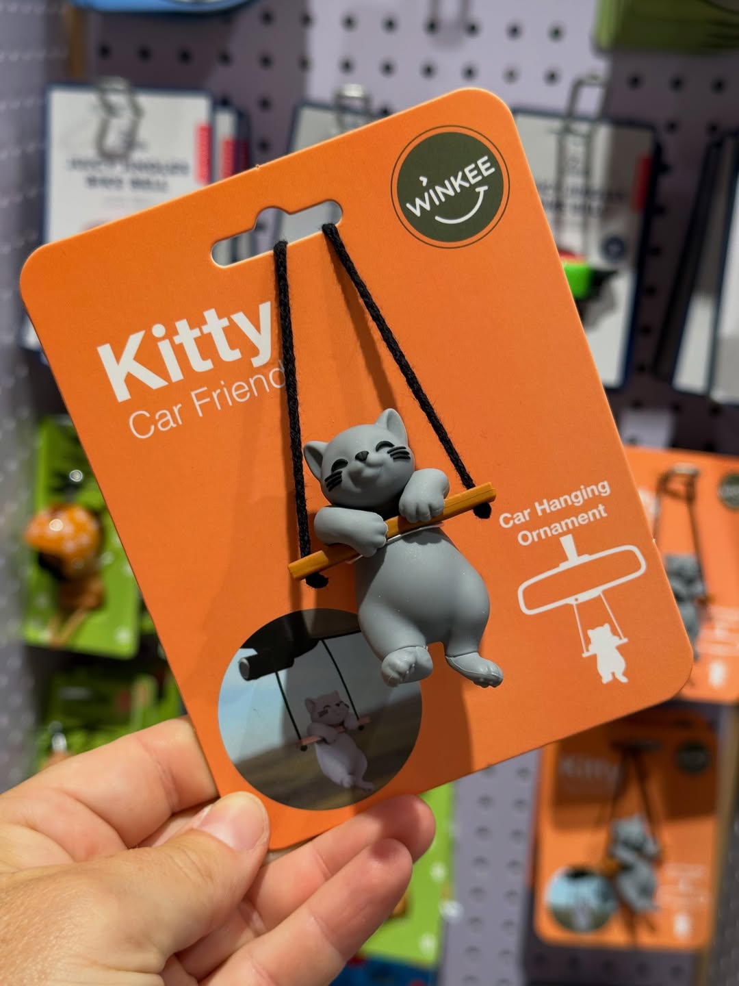 Kitty Car Friend, a cat on a swing for the car